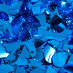 blue glass shards are scattered on the floor