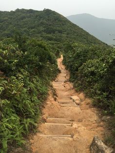 a set of steps leading up to the top of a mountain