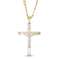 A bold 10K yellow gold cross is adorned with a 10K white gold Jesus in this stylish men's necklace. The pendant suspends from a 24-inch curb chain that secures with a lobster clasp. Gold Cross Necklaces, White Gold Cross Necklace, Gold Pendants For Men, Mens Cross Necklace, Diamond Fashion Jewelry, Cross Necklaces, Jewelry Advice, Jared The Galleria Of Jewelry, Mens Crosses