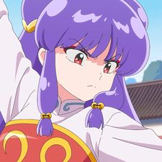 an anime character with purple hair and blue eyes holding a red object in her hand