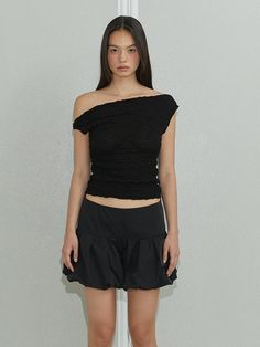 This is a casual and feminine top by MORE THAN PARADISE that is made out of high quality and sturdy material. With distinctive mood of the design and comfortable wear, you can style it for your casual daily outfit.- Boat neckline and irregular shoulder- Elastic ruffle lace fabric- Trendy, casual and feminine mood Black Stretch Sleeveless One Shoulder Top, Black Stretch One-shoulder Sleeveless Top, Black Off-shoulder Fitted Tank Top, Casual Asymmetrical Stretch Knit Top, Casual Stretch Asymmetrical Knit Top, Fitted One Shoulder Top With Foldover Top For Summer, Fitted One Shoulder Top With Foldover Design For Summer, Black Stretch One Shoulder Top For Spring, Fitted One Shoulder Foldover Top For Summer