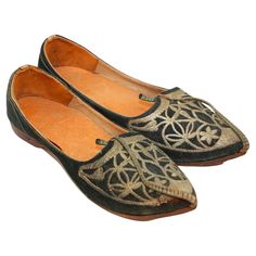 Vintage Collectible Moorish Mughal style Curled Toe Black Leather Shoes from Tony Duquette Estate. handmade with leather body, the fronts elaborately decorated in handstitched metal bullion. Tapered returned leather front projection in "genie” fashion. The decoration with very minor losses and oxidation of the metallic components. handmade to Measure for Tony Duquette in India. Tony Duquette (1914-1999) From the Estate of Tony Duquette Los Angeles California. Dimensions: 11 length x 3.5 handstit Genie Fashion, Tony Duquette, Diana Vreeland, Curl Styles, Hand Tooled Leather, Leather Slippers, Black Leather Shoes, Eclectic Style, Leather Tooling