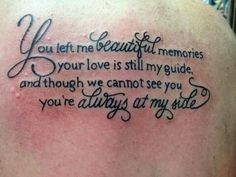 the back of a woman's shoulder with a tattoo saying you let me beautiful memories in your love is still my guide and though we cannot see you