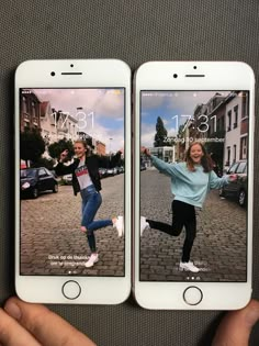 two white iphones displaying photos of people running in the street, and one is holding up her phone