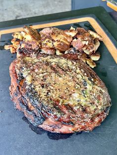 the steak has been grilled and ready to be served on the grilling pan