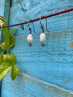 Freshwater Pearl and Oxidised Copper Earrings. I love the artisan swirly design of the earring hooks and headpins. Handmade Swirl Earrings As Gift, Handmade Swirl Earrings For Gifts, Handmade Bohemian Swirl Earrings, Adjustable Wire Wrapped Swirl Earrings, Adjustable Swirl Wire Wrapped Earrings, Bohemian Teardrop Pearl Earrings With Ear Wire, Wire Wrapped Swirl Earrings For Jewelry Making, Jewellery Elegant, Oxidised Copper