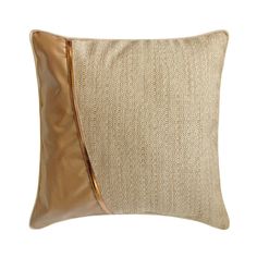 a beige and brown pillow with an orange stripe on the side, in front of a white background