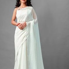 Absolutely Stunning Georgette Saree For Any Glam Occasion Or As Drapes. Blouse Not Included. Elegant White Pre-draped Saree With Sheer Dupatta, White Pre-draped Saree With Self Design, Elegant White Pre-draped Saree For Wedding, Elegant White Pre-draped Saree With Pallu, Elegant White Georgette Pre-draped Saree, White Bollywood Pre-draped Saree For Evening, White Floor-length Saree With Unstitched Blouse, White Floor-length Unstitched Blouse Piece, White Pre-draped Saree For Party