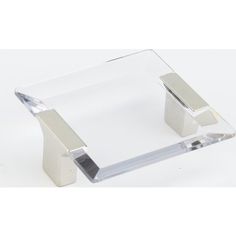 an acrylic glass and chrome plate holder with two square sections on each side