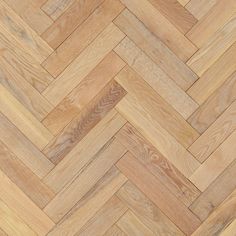 an image of wood flooring that looks like herringbones