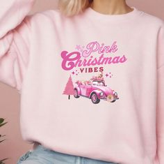 Merry Christmas vibes with pink bb style sweatshirt for the holidays! A perfect gift for her or any doll lover. This would make great holiday wear for those Hallmark movies, Christmas parades and family gatherings. In addition to the design on the front, each sleeve cuff has a pink tree on it to make the design stand out from others.   This is an original design and not sold in stores.  Exclusively sold by www.Meribyjohanna.shop. Gildan 18000: Ideal for any situation, a unisex heavy blend crewne Hallmark Movies Christmas, Barbie Sweater, Barbie Sweatshirt, Movies Christmas, Bb Style, Pink Tree, Christmas Pink, Pink Doll, Pink Barbie