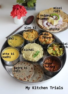 a metal plate topped with different types of food