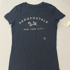 Aeropostale T-Shirt Size Extra Small. Black Shirt With White Lettering That Says Aeropostale New York City With White Rose. Aeropostale Outfits, Aeropostale Shirts, Aeropostale Tops, Christmas Wishlist, Fit Inspo, Fancy Dresses, White Rose, Fitness Inspo, Aeropostale