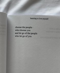 an open book with the words learning to love yourself