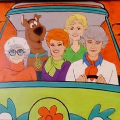 the golden girls are riding in an old car