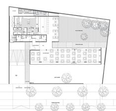 an architectural drawing shows the floor plan for a restaurant, with seating areas and tables