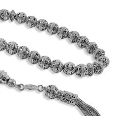 925 Sterling Silver Filigree Art 33 Beads Tasbih Prayer Beads FILIGRANIST Jewelry creates high quality, handcrafted, artisan made jewelries for men and women. This particular design was made by our master artisan, Mr. JAJA, inspired by historical places. Each bead and silver chain are made of 925 Sterling Silver. Each beads diameter is 7.50 mm. Each set of 11 beads separated by a small disc We used Sterling Silver Foxtail chain in order to keep all beads are in safe. The weight of tasbih is 38.0 Traditional Rosary Bracelet With 8mm Beads, Traditional Silver Rosary With Polished Beads, Traditional Silver Beaded Rosary, Historical Places, Sterling Silver Filigree, Silver Filigree, Prayer Beads, Silver Chain, Silver Bracelet