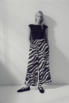 Ankle-length pants in softly draped  woven viscose fabric. High waist  covered elastic at waistband  and discreet side-seam pockets. Straight  wide legs. Chic Culottes With Loosely Fitted Hips, Spring Wide Leg Pants With Gathered Waist, Chic Bottoms With Gathered Waist For Spring, Chic Evening Bottoms In Viscose, Wide Leg Pleated Waist Pants For Summer, Wide Leg Pants With Pleated Waist For Summer, Summer Trousers With Pleated Waist, Summer Wide-leg Pants With Pleated Waist, Summer Evening Bottoms With Pleated Waist