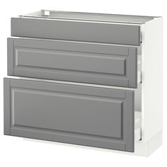 a white and gray kitchen cabinet with two drawers on each side, one drawer open