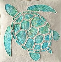 a decorative pillow with a sea turtle on it