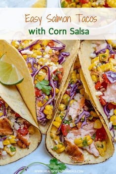 easy salmon tacos with corn salsa on the side and lime wedges next to it