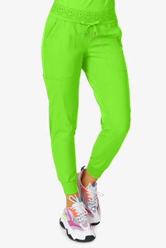 Our Ava Therese Smile Face 6-Pocket Jogger Pants may be the most fun joggers ever! With these wonderful colors and smile face waistband you will stand out from the crowd. Plus talk about functional, plenty of pockets and rib-knit details complete the awesomeness. Zavate Ava Therese is made for the toughest work days in Synergy 4-way stretch. Complete with moisture wicking tech, our styles don t stop with modern looks, they re functional and high-performing. • Modern fit • Mid-rise • Smile face e Stretch Sports Cargo Pants, Stretch Sports Pants With Pockets, Stretch Cargo Pants For Sports, Green Comfort Stretch Sports Bottoms, Athleisure Bottoms With Pockets And Comfort Stretch, Comfort Stretch Sports Pants With Pockets, Stretch Full-length Joggers With Side Pockets, Athleisure Stretch Cargo Pants With Side Pockets, Stretch Athleisure Cargo Pants