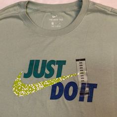 Brand New With Tags Attached Men’s Size Xxl Nike T-Shirt Color Light Green & A Multicolor “Just Do It” Please See All Attached Pictures For Any Additional Details Nike Green Graphic Print T-shirt, Nike Green T-shirt For Streetwear, Green Nike Crew Neck T-shirt, Green Nike T-shirt For Streetwear, Nike Green T-shirt With Graphic Print, Nike Green Short Sleeve T-shirt, Nike Green Relaxed Fit Top, Casual Green Nike T-shirt, Nike Green Graphic Tee