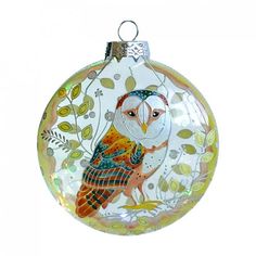 a glass ornament with an owl on it