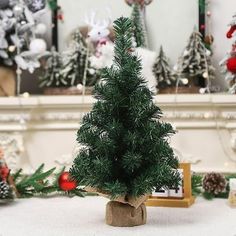 a small christmas tree sitting on top of a table