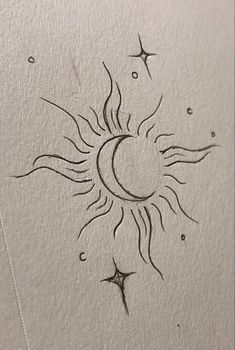 the sun and stars are drawn on paper