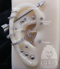 a close up of a cell phone with many different types of beads on it's back