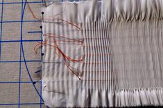 a piece of fabric is being sewn together