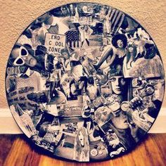 a plate with many pictures on it sitting on a wooden floor next to a wall