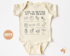 Baby Baby Bodysuit - Life Is Better At The Beach Bodysuit - Summer Adventure Baby Retro Natural Baby Bodysuit All of the shirts and bodysuits at our shop are CPSIA compliant. We only use Eco-friendly, water-based inks that are also CPSIA compliant and boasts strong washability (highest score on AATCC wash test).  So rest assure to put them on your little ones!  ** COLOR OF T-SHIRTS WILL VARY SLIGHTLY DUE TO LIGHTING AND/OR MONITOR SETTINGS ** DETAILS OF BABY BODYSUITS & T-SHIRTS MAY VARY SLIGHTL Summer Beach Onesie With Short Sleeves, Spring Beach Onesie With Short Sleeves, Short Sleeve Cotton Onesie For The Beach, Casual Short Sleeve Onesie For Beach, Casual Short Sleeve Onesie For The Beach, Casual Short Sleeve Beach Onesie, Fitted Beach Onesie For Summer, Summer Graphic Print Onesie For Playwear, Summer Beach Fitted Onesie