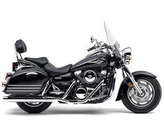 a black and silver motorcycle is shown on a white background in this image, there is also a side view of the bike