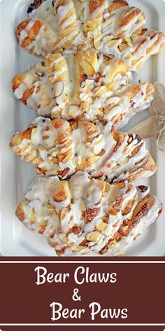 bear claws and bear paws bread is on a white plate with brown lettering that says bear claws and bear paws