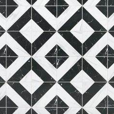 a black and white tile pattern that looks like it has been made out of marble