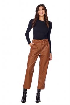 The Ballard Leather Pants are a stylish and versatile addition to any wardrobe. Crafted from high-quality faux leather, these wide leg pants offer a sleek and edgy look. The elastic waist ensures a comfortable and secure fit, while the faux pockets add a touch of sophistication. With an inseam measuring approximately 26 3/4" on size small, these pants are designed to flatter and elongate the legs. Made from PU leather, they provide the luxurious feel and appearance of genuine leather without the Fall Brown Wide-leg Leather Pants, Trendy Leather Pants For Business Casual, Leather Wide Leg Pants For Workwear In Fall, Fall Faux Leather Wide-leg Pants, Sleek Brown Leather Bottoms, Wide-leg Leather Pants For Work In Fall, Business Casual Faux Leather Pants, Sleek Brown Leather Pants For Night Out, High-waisted Faux Leather Business Casual Pants