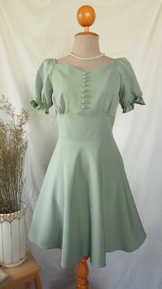 DHL shipping upgrade is available at check out process. Shipping part by DHL will take 3-6 days only. It costs USD13 in addition from standard shipping cost. Production time may take around 1-2 weeks. If this is in rush you can convo us to make it sooner.:) ♥ Snow White series in sweet classy sage green. The dress is elegant and so fairytale in vintage style for this season. Delicate dress to special occasion and party. This will make you stunning. Item detail: - Puff sleeve  - Button adornment.  - Princess waistline  - Swing skirt flare shape - Close back, back zipper. - Fully lined. Try and you will love this dress.:) Listing not including any accessories. ✄ MATERIAL ✄ *Pepe Fabric (great volumn and content, high quality polyester) *Lace *Lining material ✄ SIZE ✄ This is the body measure Homecoming Dresses Modest, Sundress Party, Sage Green Bridesmaid, Mint Green Bridesmaid Dresses, Dress Sage Green, Delicate Dress, Dark Red Dresses, Summer Palette, Sage Green Bridesmaid Dress