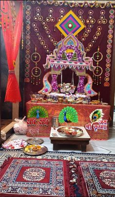 an elaborately decorated stage with food and decorations