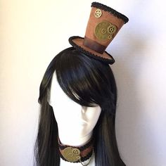 Adults Mini Steampunk Hat And Choker In Brown, Steampunk Accessories, Mini Steampunk Hat With Gear, Steampunk Hat With Headband. This steampunk ornate Top Hat with headband is a classic that is sure to suit any of your cosplay ensembles help your look stand out at your next convention or other social events. Choosing the custom theme Hat option? Whether you are a high-society aristocrat, a brilliant Steam engineer or a greasy Steam-machine mechanic, your customized hat will work wonderfully with almost any ensemble.  S I Z E  Detailed dimensions available upon request. Thank you for supporting small businesses and hope our products bring you and loved ones some joy and humor in these trying times.    C U S T O M I Z A T I O N You can choose custom theme option and get in touch for a fully Elegant Face Mask, Steam Machine, Thank You Wishes, Your Cosplay, Steampunk Hat, Prom Dance, Carnival Festival, Neo Victorian, Riding Hats