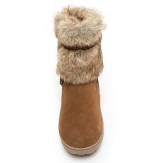 Shake up your style with a boot for snowy treks. Featuring layers of cascading faux fur accented by a braided suede tie, you'll demand attention at every turn. This water repellent winter boot is ideal through the wintery months for a playful edge that goes with any outfit.