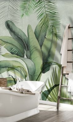 a bath tub sitting next to a wall with green leaves on it and a ladder in front of it