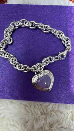 ALWAYS MARKED 925 or STERLING:  Silver Heart with center heart of amethyst on Silver Chain  (7.25" long).  Marked CNA 925 Thailand. Amethyst Silver Bracelet, Sterling Silver Heart, Chain Link Bracelet, Silver Heart, Link Bracelets, Arm Band, Chain Link, Favorite Jewelry, Silver Chain