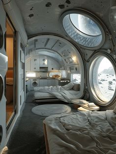 the interior of a space station with two beds and windows on each side of the room