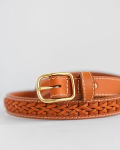 Lindquist's Vachetta leather belt is embellished with a two-strand braid and with a solid natural brass hardware. Strand Braid, Clog Boots, Attention To Detail, Braided Belt, House Shoes, Brass Hardware, Leather Belt, Honey, Braids