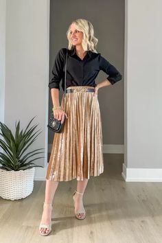 Velvet gold skirt styled with a black blouse! This is a great holiday party outfit! Perfect for Thanksgiving, this chic mom outfit idea pairs classic elegance with winter warmth for an effortless look Skirt For Winter, Gold Pleated Skirt, Gold Skirt