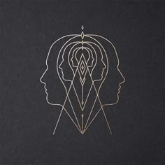 the cover art for an upcoming album, featuring two faces and lines in gold on black paper