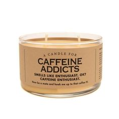 a candle that says caffeine adicts on the front and side of it