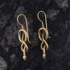 brass Snake Dangle Earrings, Snake drop Earrings, Serpent Earrings, snake wrap earring, METAL :- Brass ❥ Customers satisfaction is our biggest priority, please contact us with any questions/queries for future or existing orders, and we will do our best to make sure you are happy with your order. ♥ Please Make Sure to Include The Correct Address During Before Order. You Can return Item within 30 Days After Successful Delivery. We Offer 100% Money Back Guarantee If You Not Satisfied With Your Purchase. Return Charge Will Be Paid By Buyer Only. This is my shop link https://www.etsy.com/in-en/shop/AustereGifts?ref=seller-platform-mcnav Thank you🥰 for shopping with us! Serpent Earrings, Earrings Snake, Golden Snake, Gothic Earrings, Snake Jewelry, Dragon Jewelry, Snake Earrings, Gold Snake, Brass Earrings